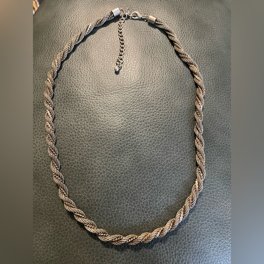 Silver tone mixed texture chain twist necklace with an extension. Womens jewelry